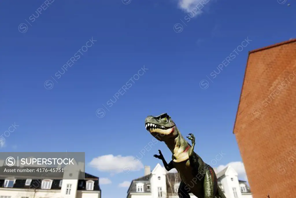 Tyrannosaurus rex on rampage in residential area, Copenhagen, Denmark.