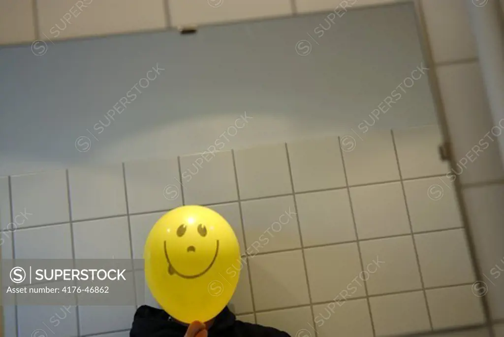The photographer with a smiling balloon face, Copenhagen, Denmark.
