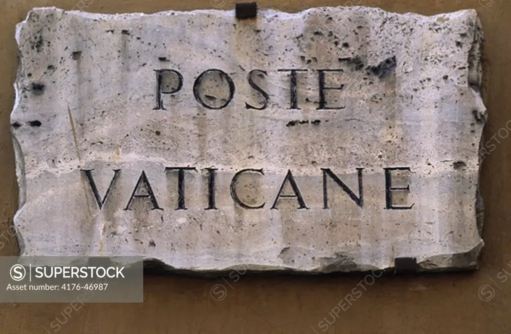 Close up view of a stone nameplate in Italy
