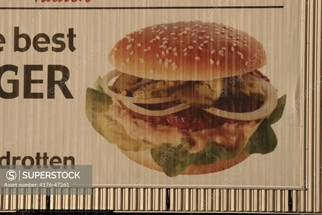 Close-up view of a burger poster