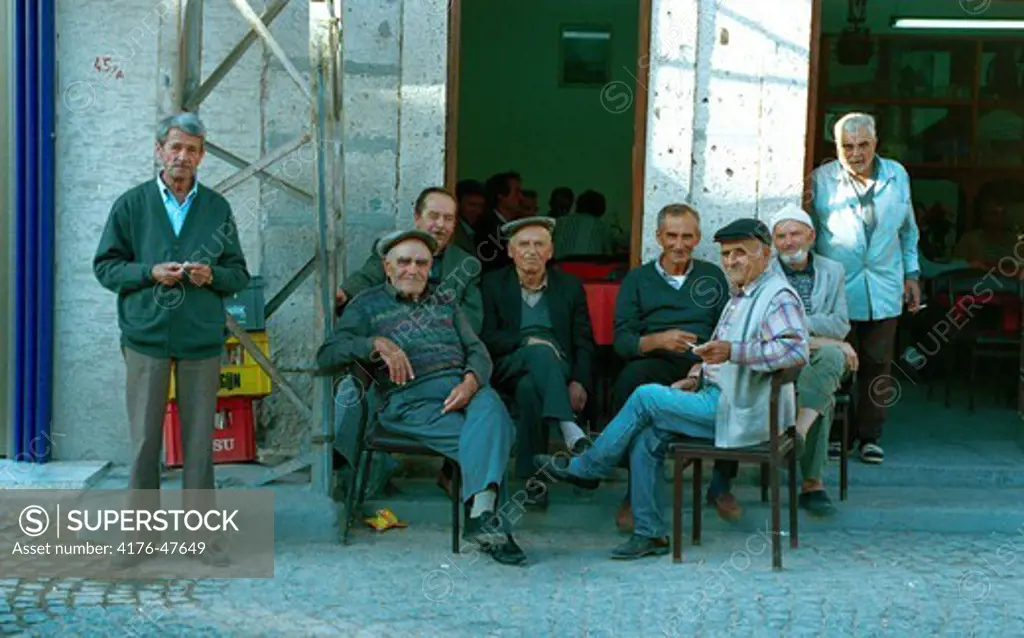 Group of older men outside a cafe. Izmir. Turkey.