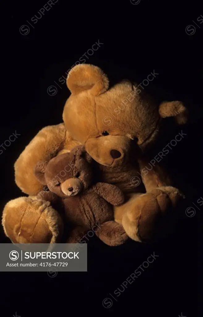 Closeup view of teddy bears with black background