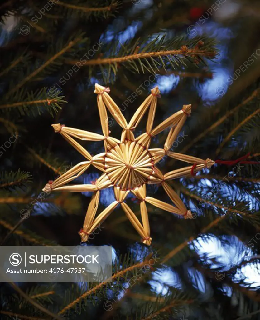 Christmas decoration made of straw in christmas tree