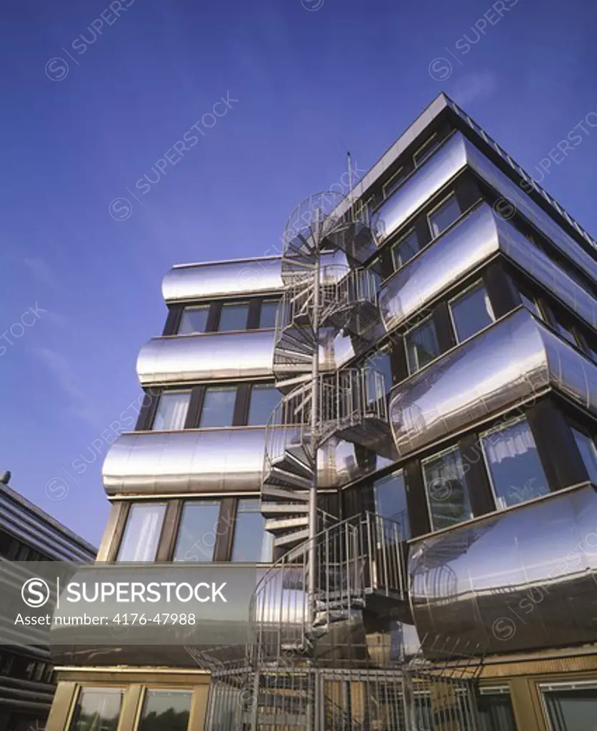 Building with spiral staircase and glass windows