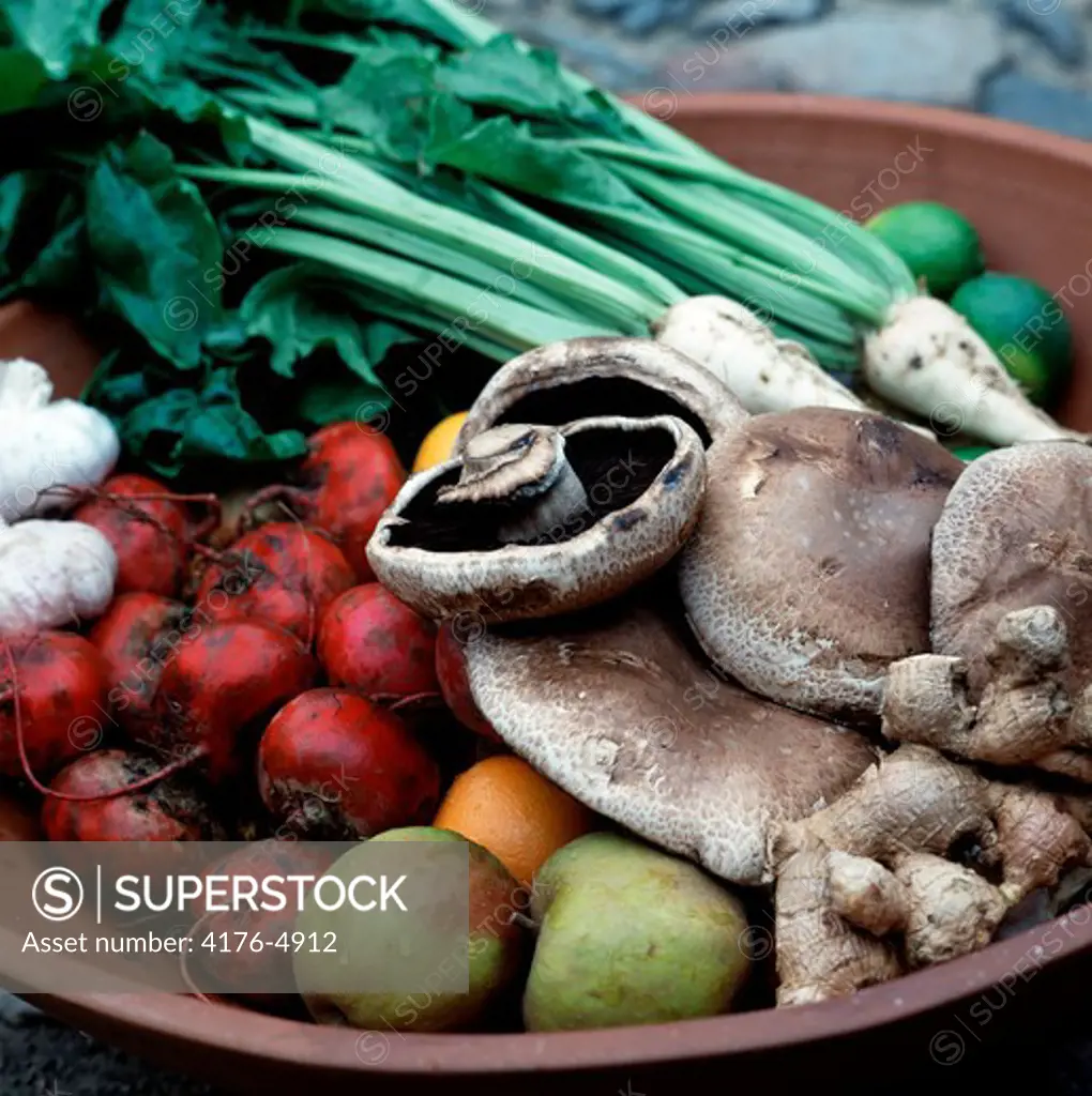 Close-up of vegetables and fruits on a bowl