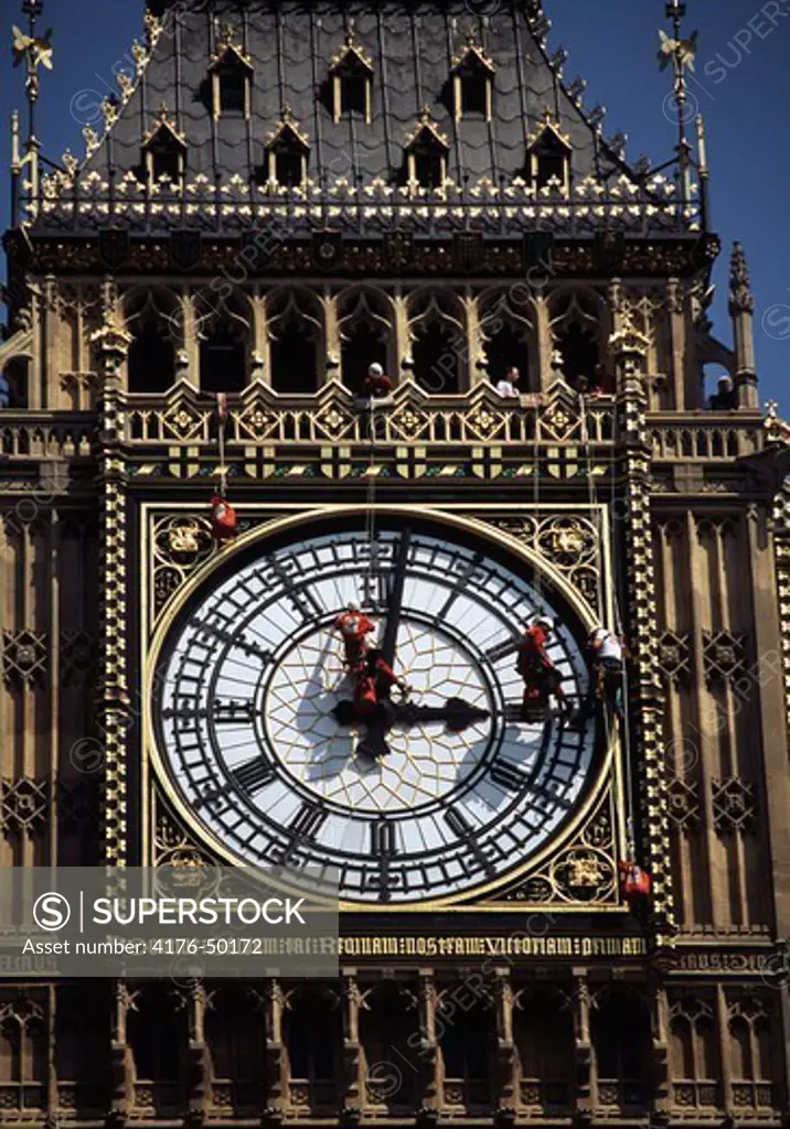 Workers cleaning Big Ben, London
