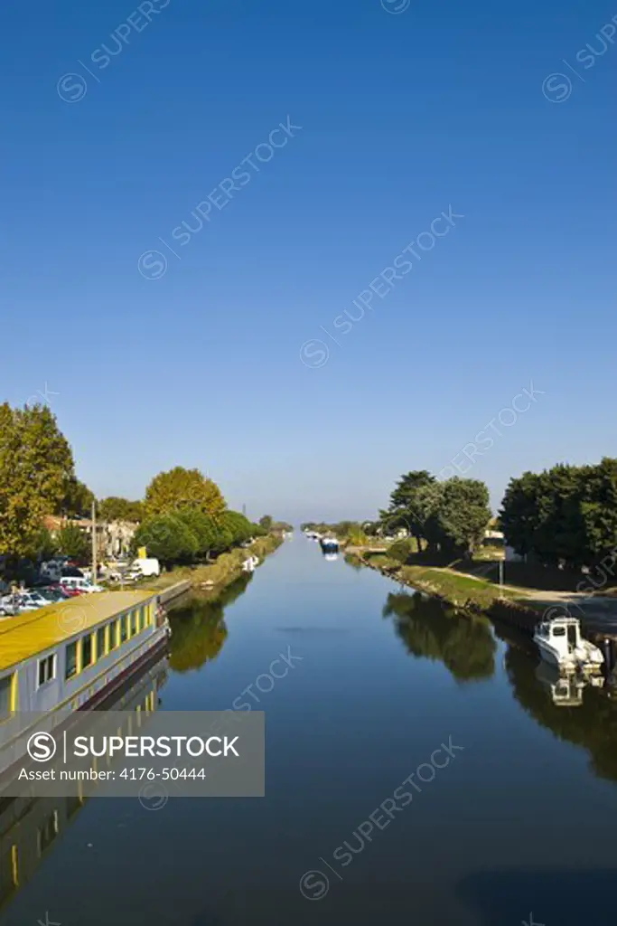 Rhone Channel with houseboats, Camargue, France