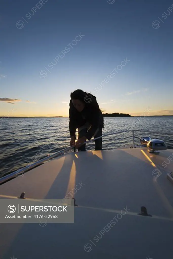 A girl on a boattrip in the archipelago of Sweden.