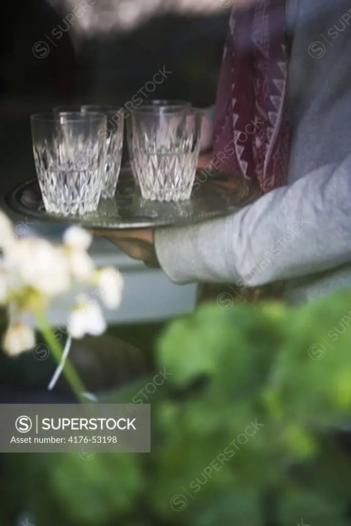 A try with three glass of water seen through a wind