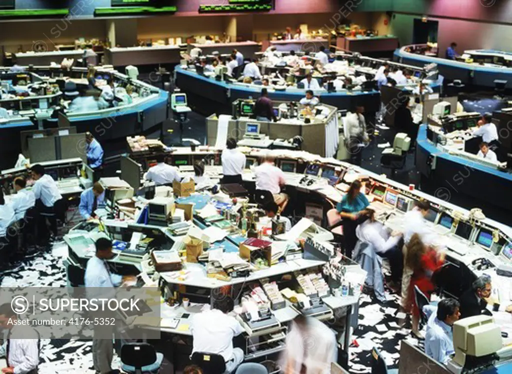 Brokers and computers on Pacific Stock Exchange floor in Los Angeles