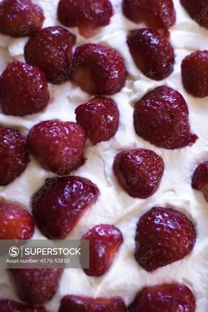 Strawberries and cream on a cake