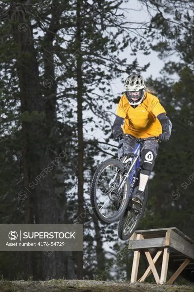 Person performing a stunt on a bike, Finland.