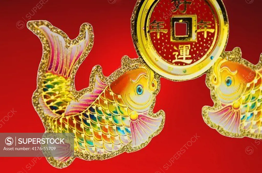 chinese papercut goldfish on a red background
