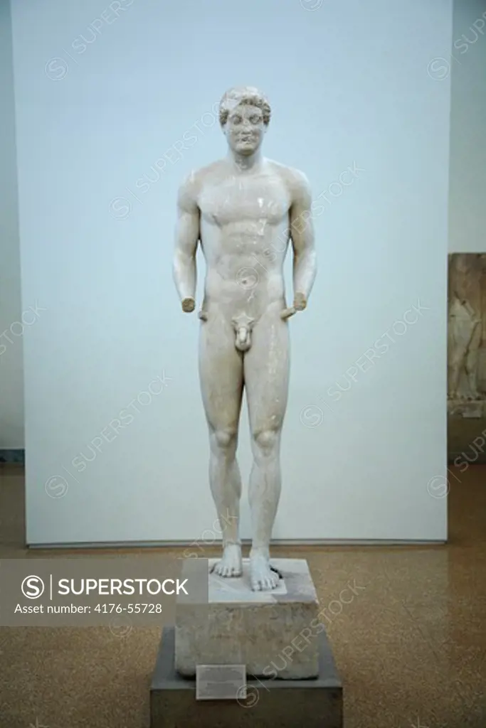 Funerary Kouros Statue. Parian marble. Found in the area of the Mesogeia, Attica. About 510 - 500BC.