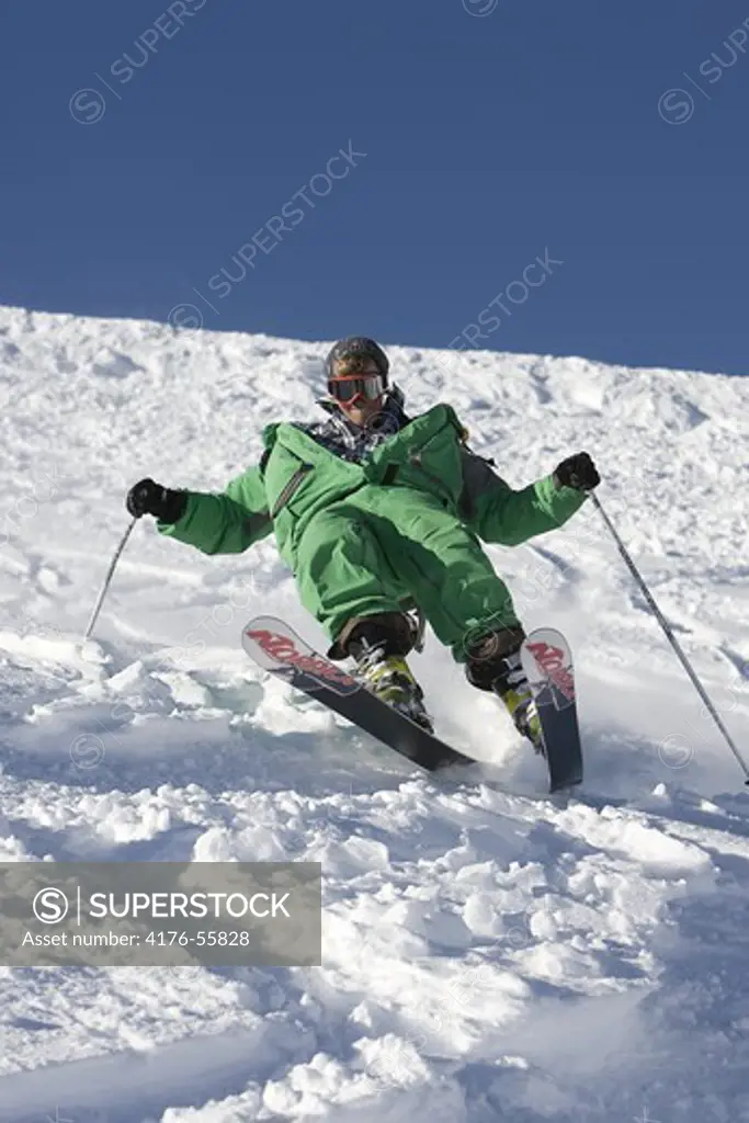 Skier in green