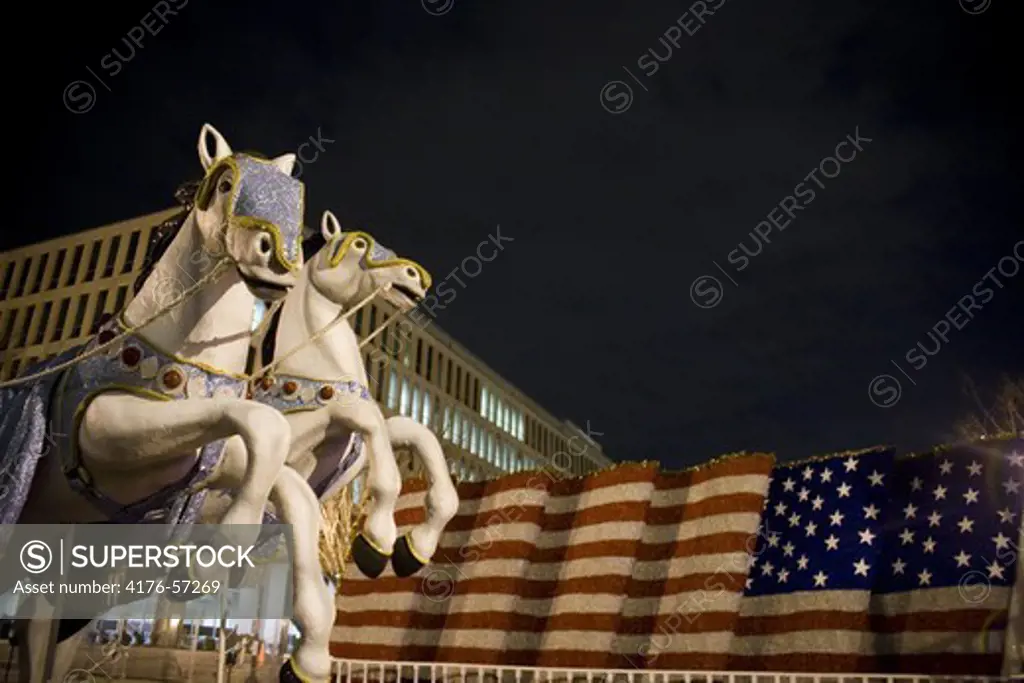 Floats line the streets of Washington D.C. in prepartion for the Inaugural parade the night before President Elect Barack Obama is sworn into office.