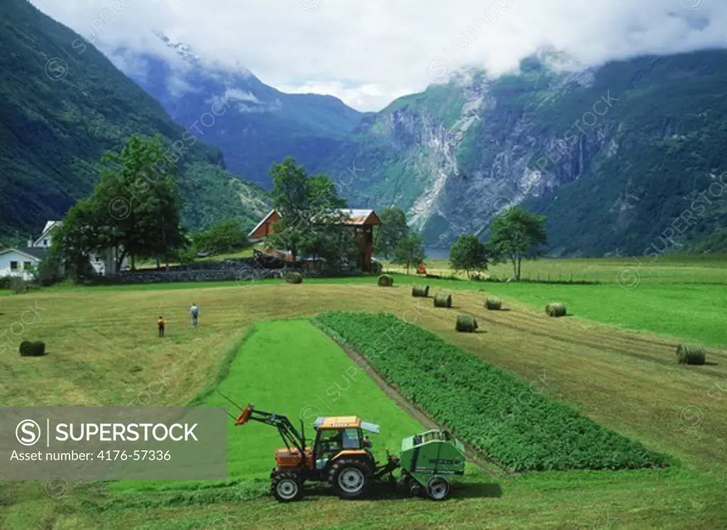 Farm and tractor near Geiranger above Geirangerfjord on the coast of Norway