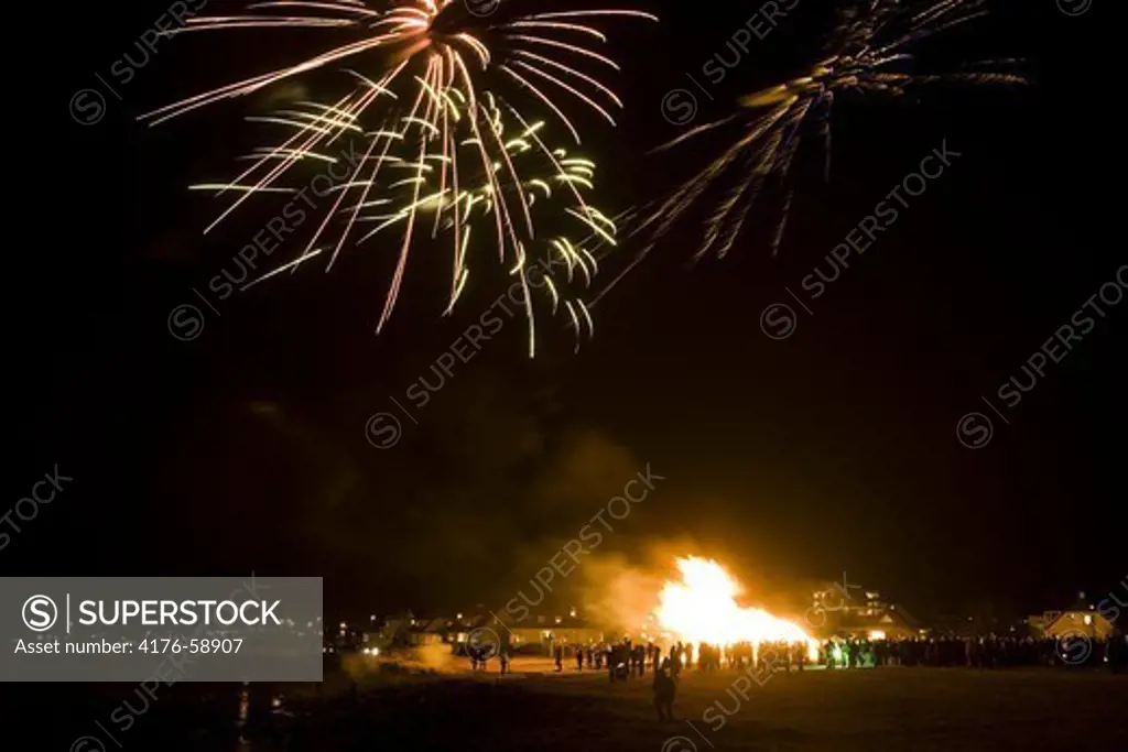 Fireworks and a bonfire on New Years Eve.  Aegissida, Reykjavik Iceland
