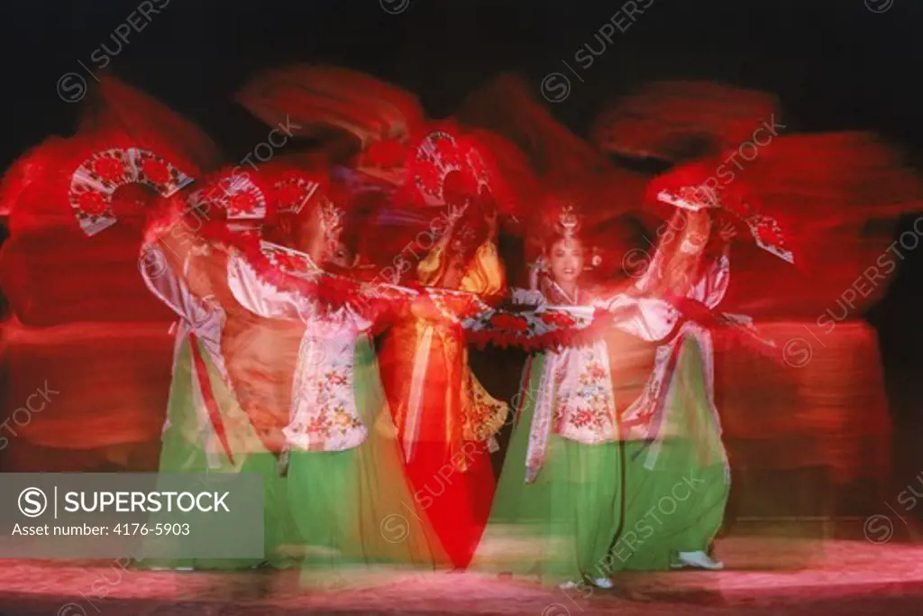 Woman performing traditional Fan Dance in South Korea