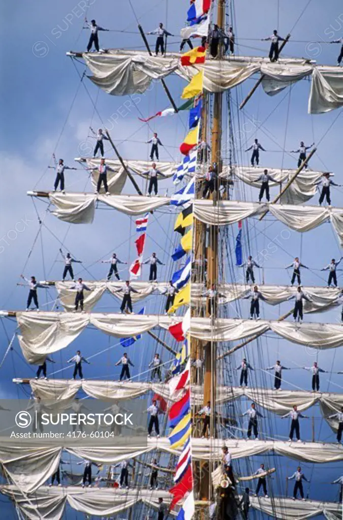 Sailors standing on the masts of the 3 masted schooner ""Cvavatemoc"" as part of the Mexican Navy in Tall Ships race