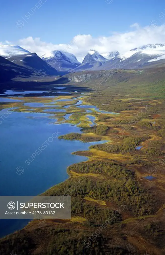Aerial view of Latjovagge valley with lakes and river below Kebnekaise Mountains in Swedish Lapland