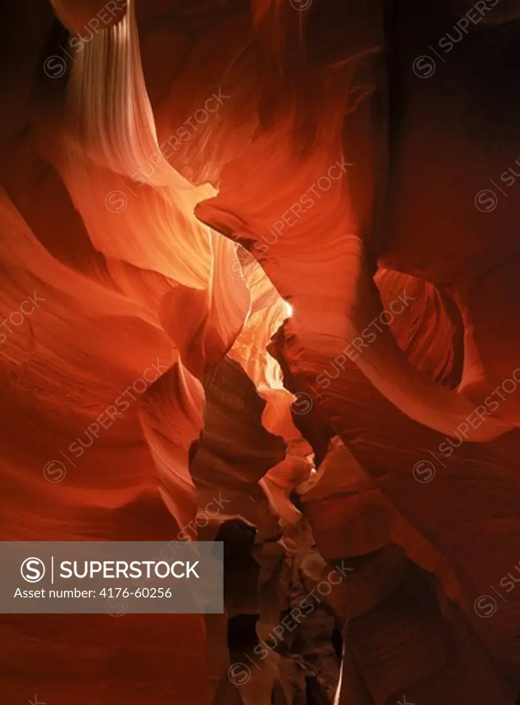Light seeping through sandstone rock formations in Antelope Canyon near Page, Arizona