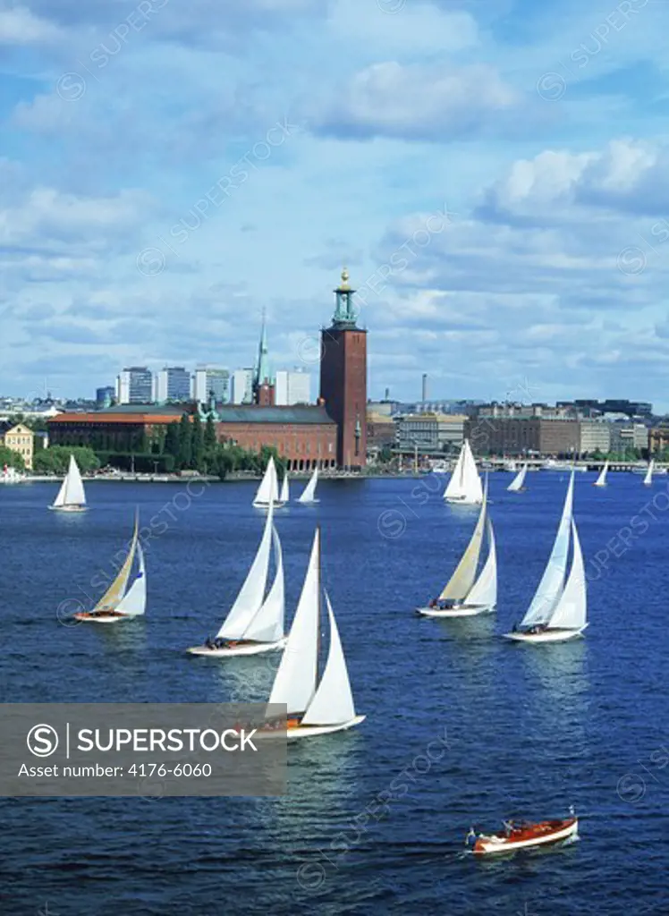 Sailboat Day in Stockholm on Riddarfjarden with City Hall beyond
