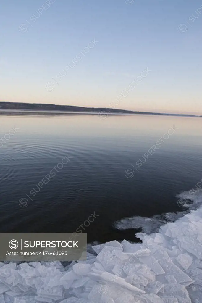 Winter lake with icy beach, Alnän, Sweden