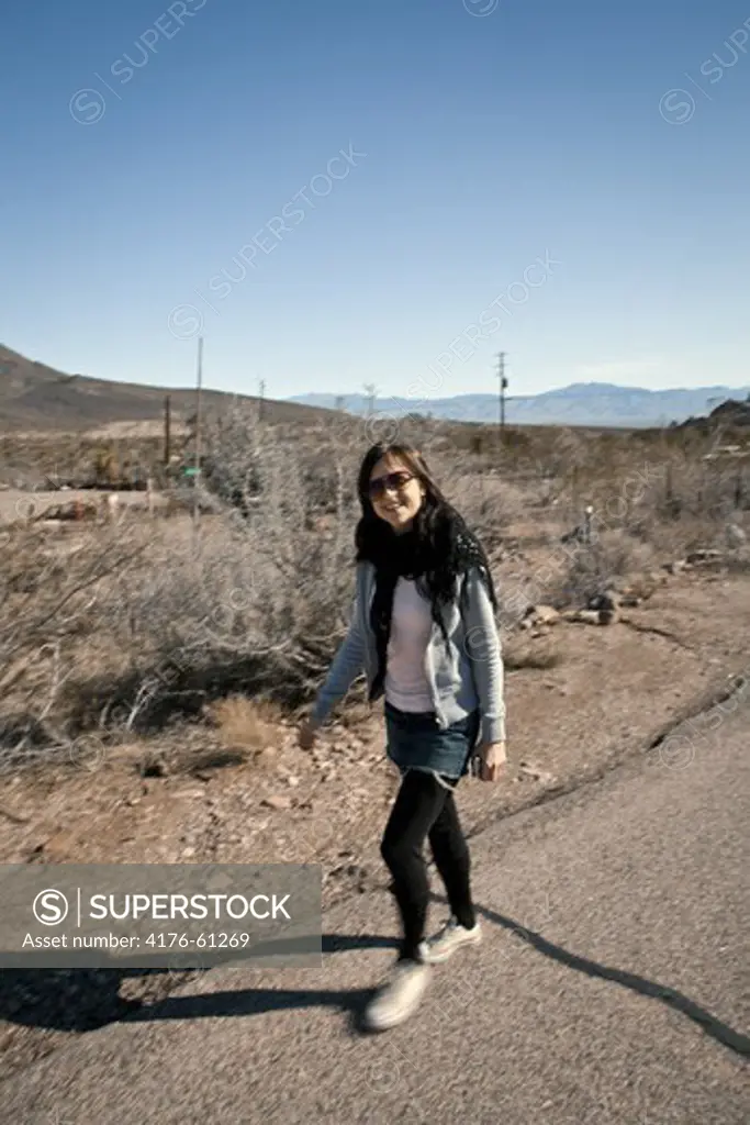 Woman walking on Route 66, Arizona, USA, Arizona, USA