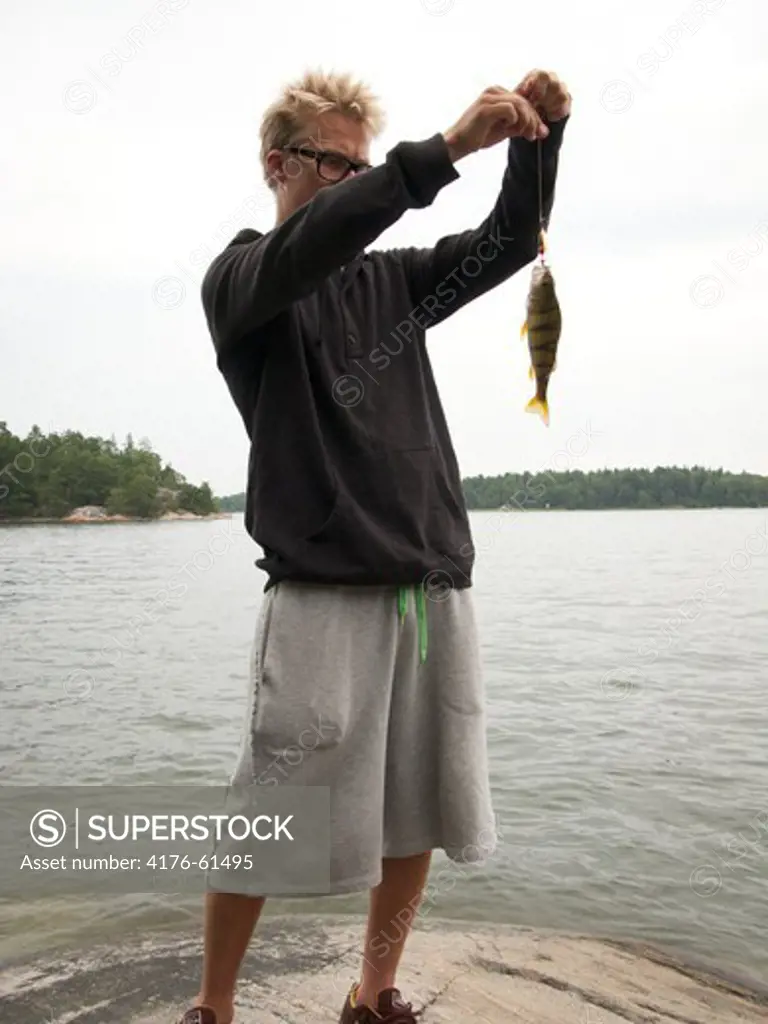 Man caught fish, Stockholm, Sweden