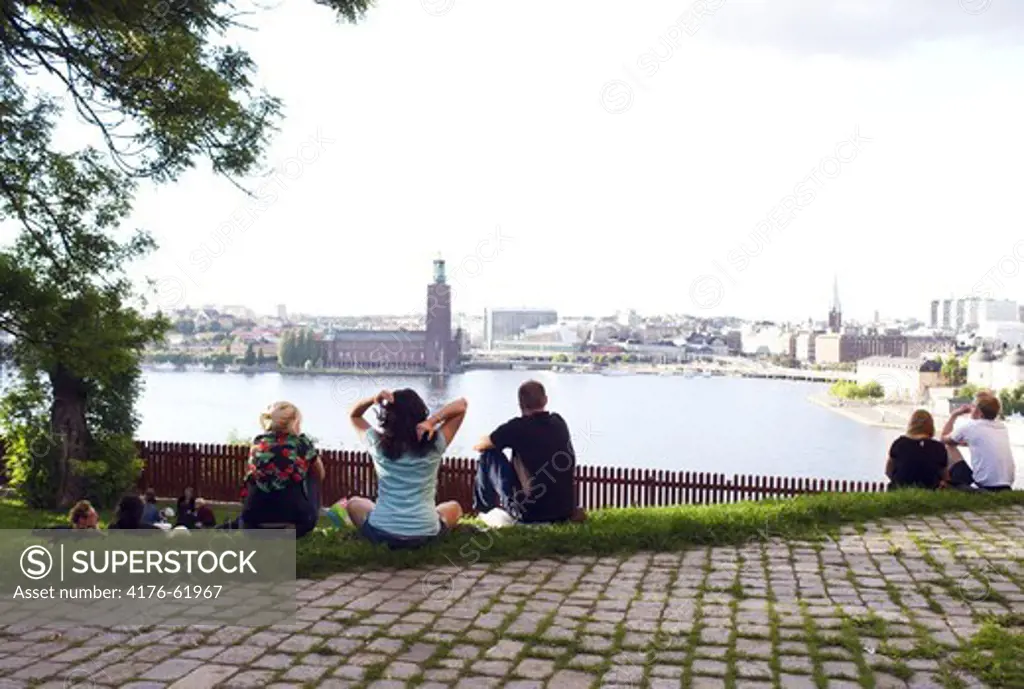 People having picnic overviewing Stockholm