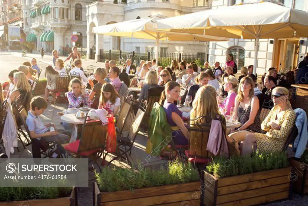 A crowd of people on a bar/restaurant in Blasieholmen Stockholm