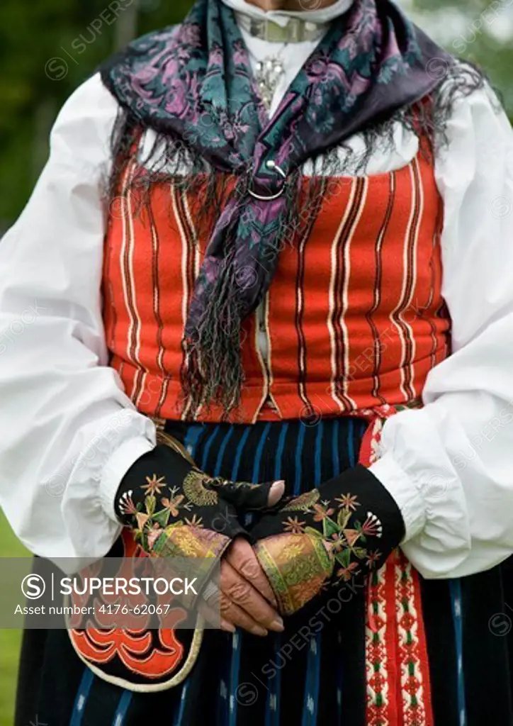 A close up picture of a woman wearing the folk costume of Hlsingland, Sweden