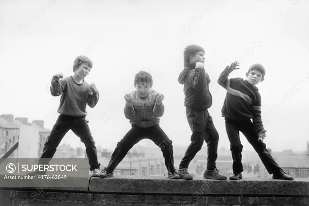 Boys on a wall in Dublin.Ireland.