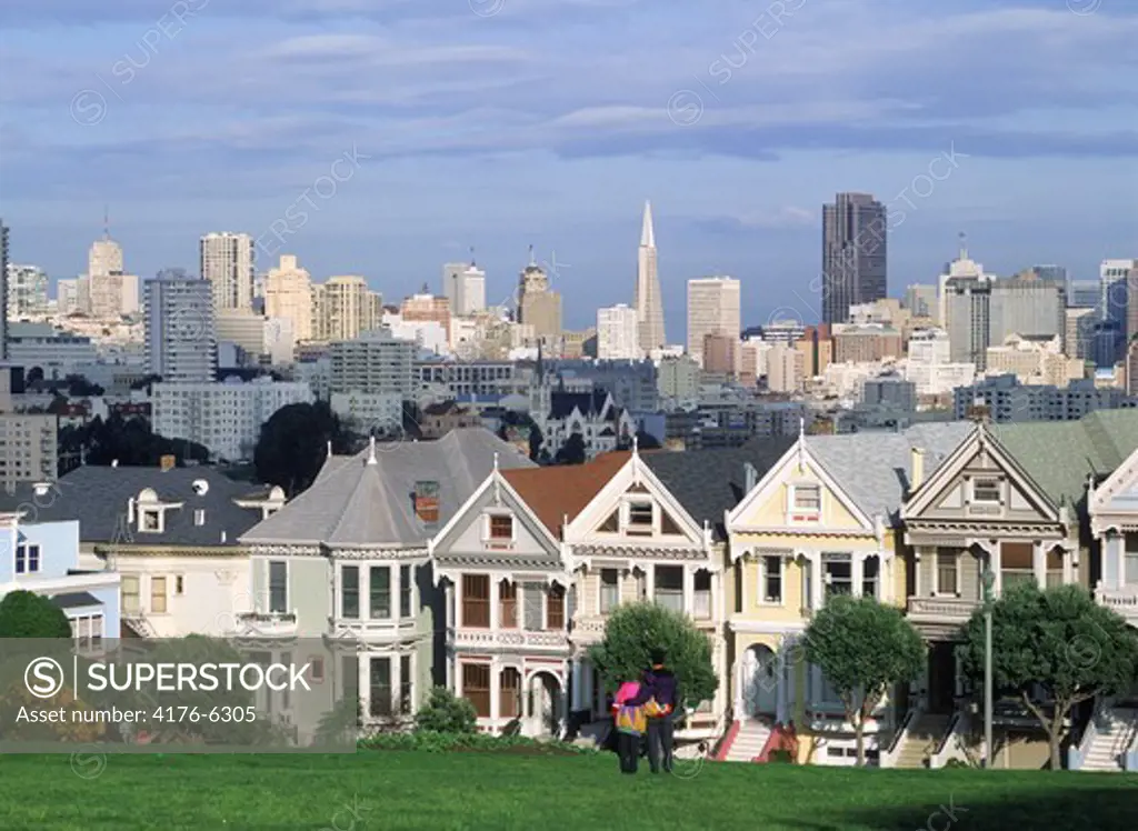 Victorian Houses on Steiner Street with San Francisco skyline