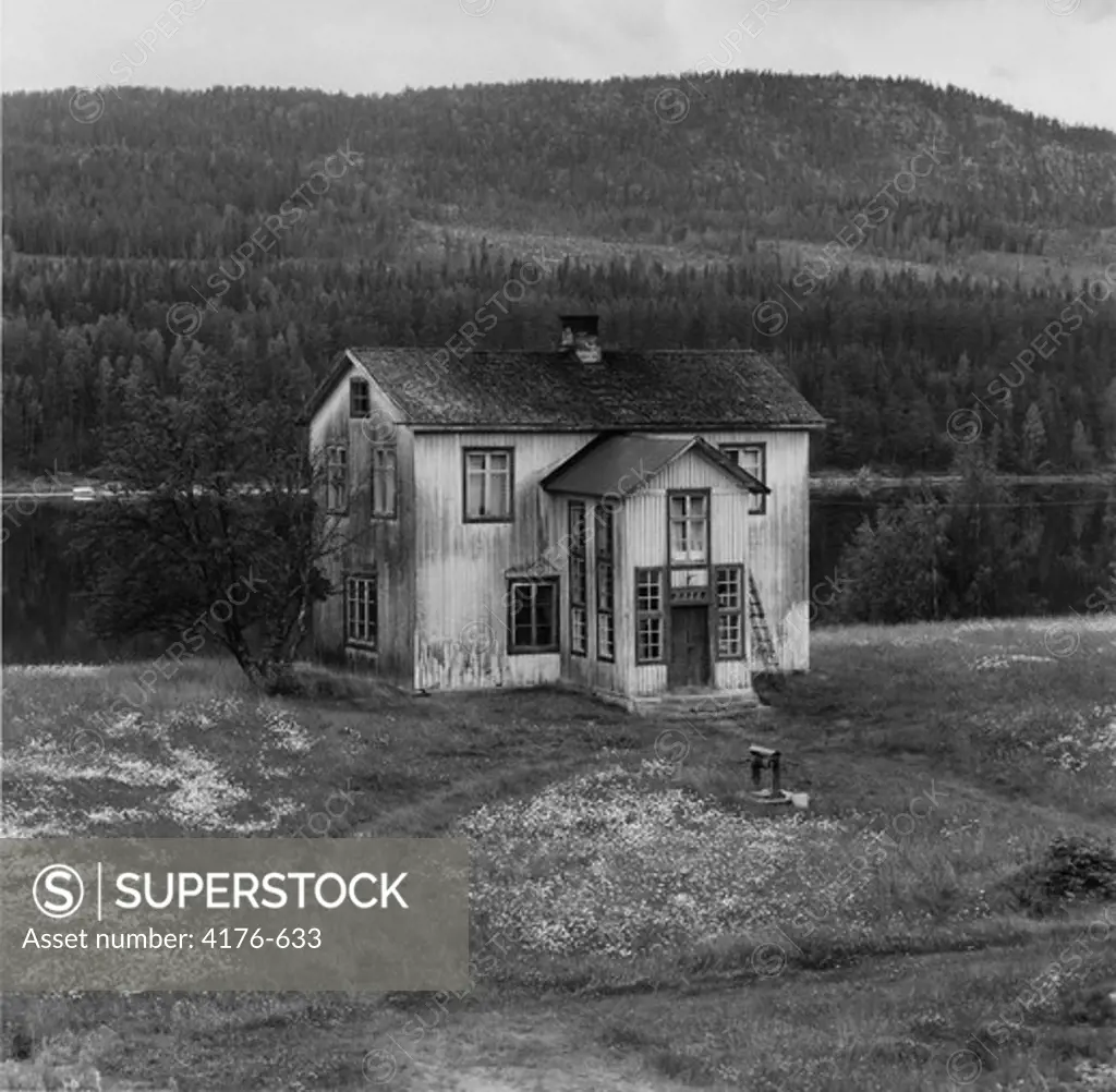 Old scuffed house at the edge of a forest. Norrland, Sweden