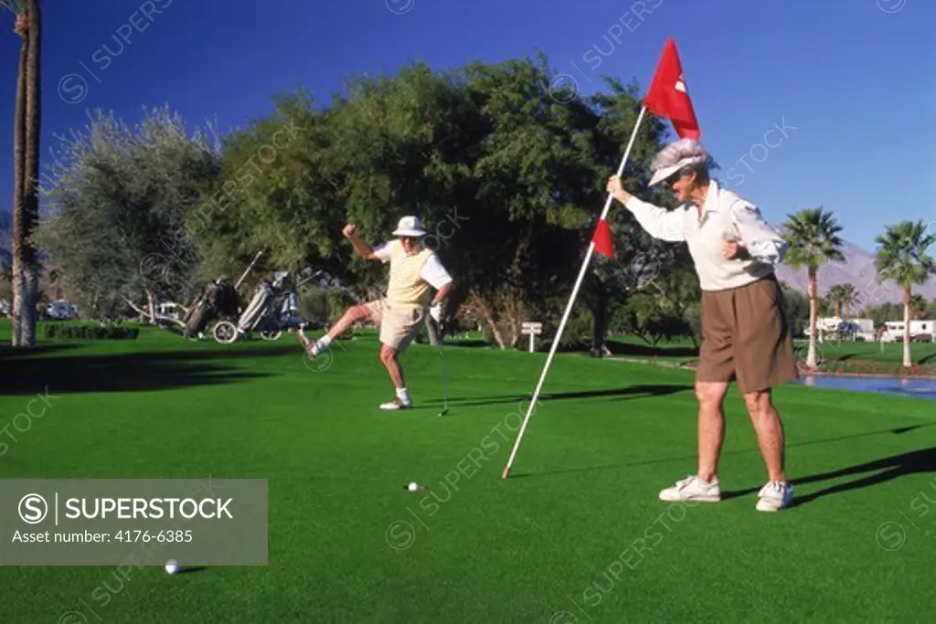 Senior citizens putting on green in Palm Springs California