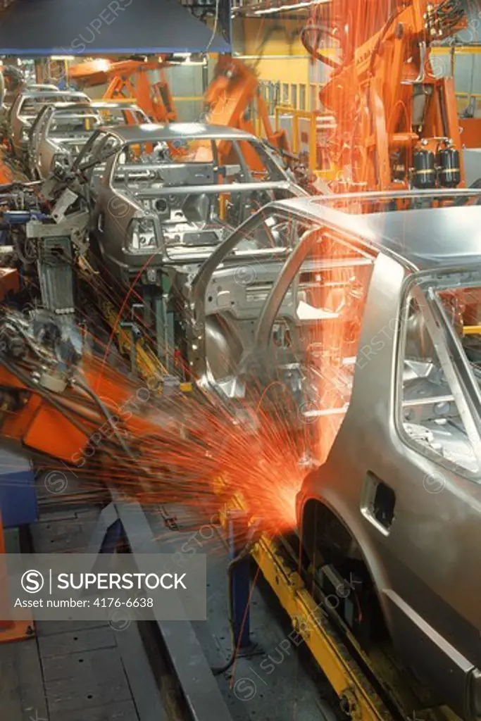 Sparks flying from robatic spot welding at SAAB Scania plant in Sweden