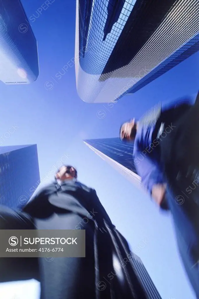 Business partners moving through Los Angeles skyscrapers