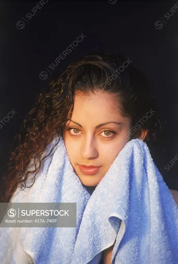 Persian woman toweling off after bath