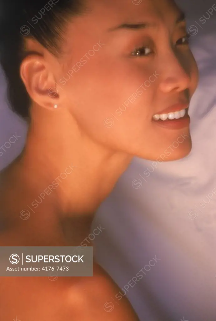 Profile of beautiful Asian woman