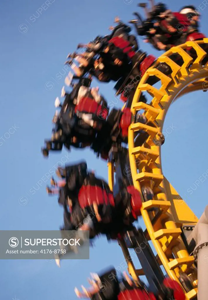 Low angle view of a group of people on a rollercoaster, Liseberg, Bohuslan, Gothenburg, Sweden