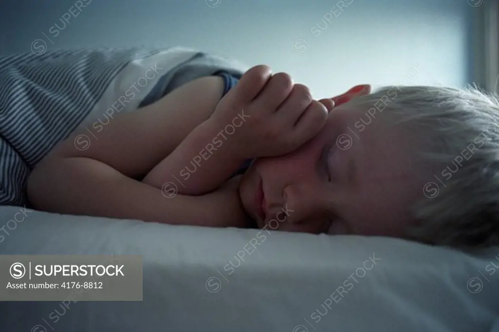 A five-year-old boy sleeping. Sweden