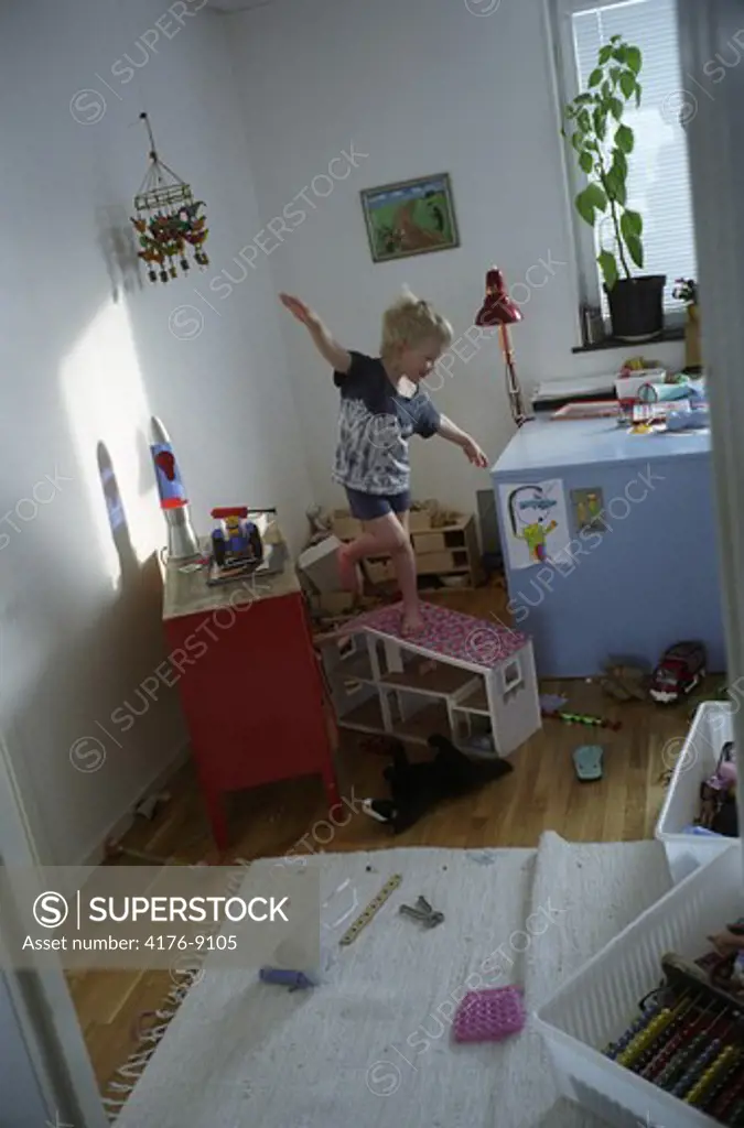 A small boy playing in his room. Sweden