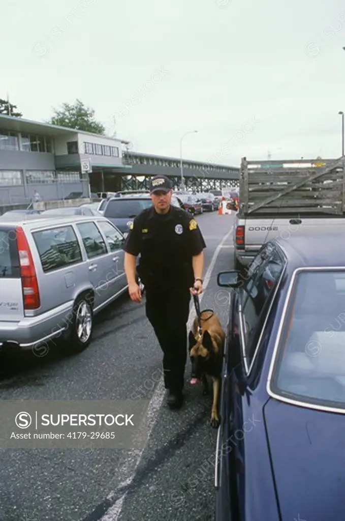 Explosive Sniffing Dog, Homeland Security, Patrolman at Seattle Ferry, Washington