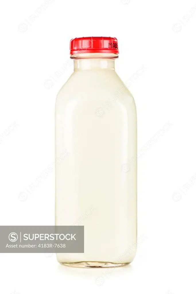 Isolated glass bottle of nutritious white milk