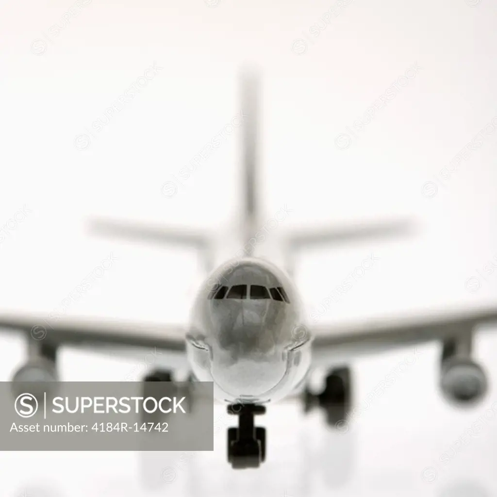 Selective focus of miniature model commuter jet airplane.