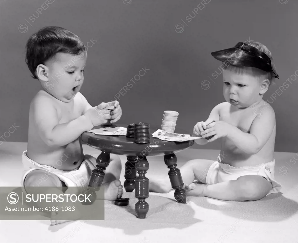 1960S Two Babies In Diapers Playing Poker Cards Wearing Visors