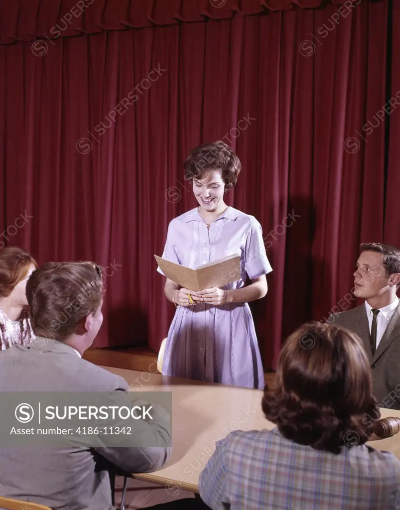 1960S Teen Students At Conference Table
