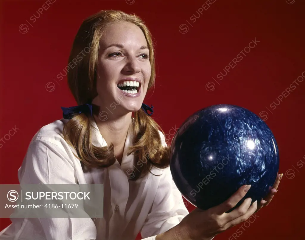 1960S Laughing Young Woman Holding Bowling Ball Her Hair In Pigtails